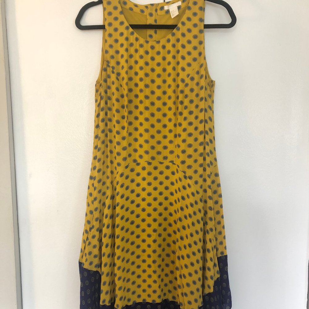 Sleeveless Dress with Asymmetrical Hemline